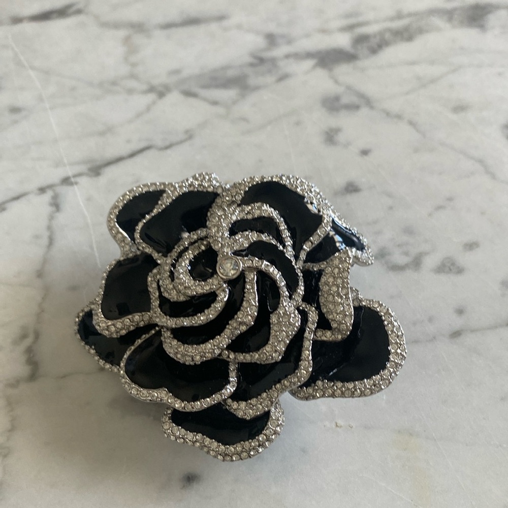 Joan Rivers silver plated, black enamel and rhinestone gorgeous gardenia brooch